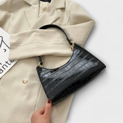 Nora. Glänzende Lederhandtasche