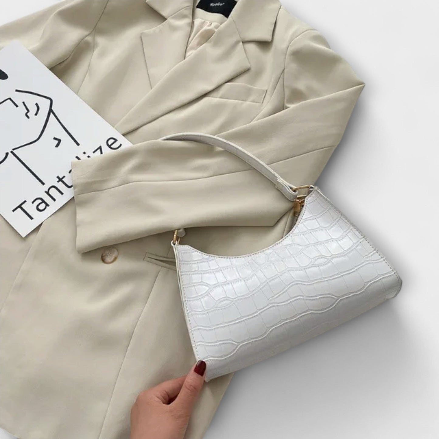 Nora. Glänzende Lederhandtasche