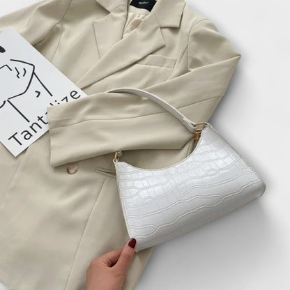 Nora. Glänzende Lederhandtasche